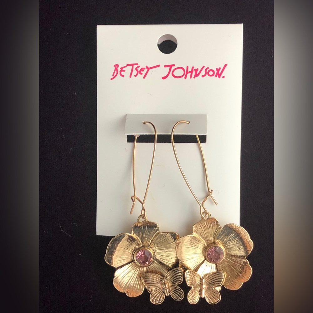 Betsey Johnson dangle flower earrings with a purple center stone and butterfly